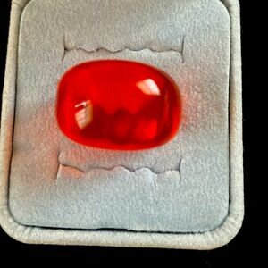 Reddish/Orange lucite ring.
